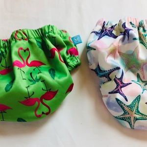 Set of two Honest swim diapers (M & L)